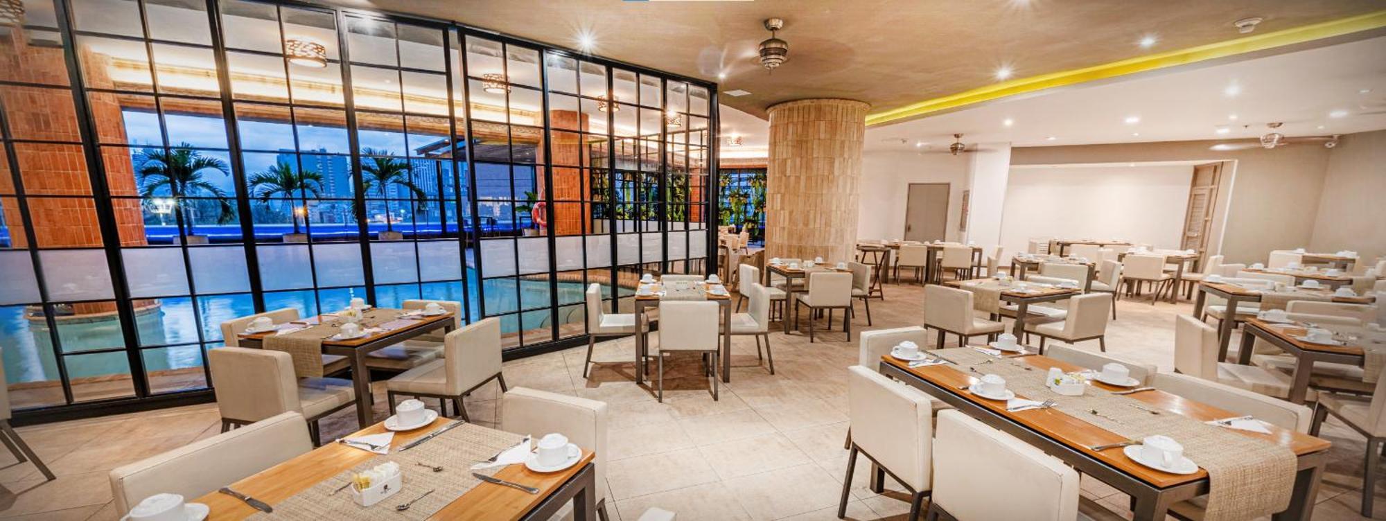 Hotel Dann Cali Esterno foto The restaurant